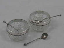 A pair of silver mounted glass