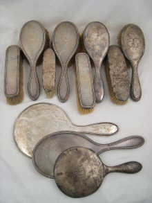 A five piece silver brush set comprising