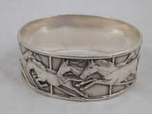 A French hallmarked cast silver bangle