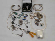 A quantity of jewellery set in