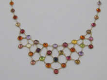 A multi gem necklace set in yellow 14f39e