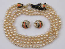 A faux coral onyx pearl and diamond 14f3a3