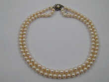 A two row cultured pearl necklace 14f3b8