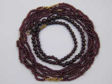 A three row garnet bead necklace 14f3e2