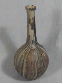 A small glass bottle of striated variegated
