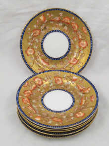 A set of six tea plates with enamel
