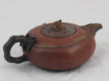 A Chinese ceramic Yixing teapot