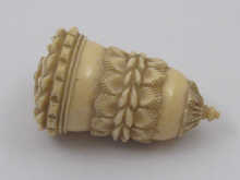 An ivory thimble holder finely