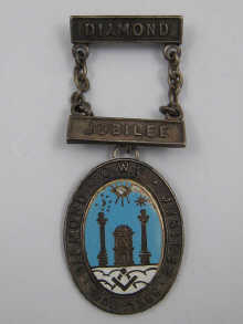 A silver Masonic medal commemorating