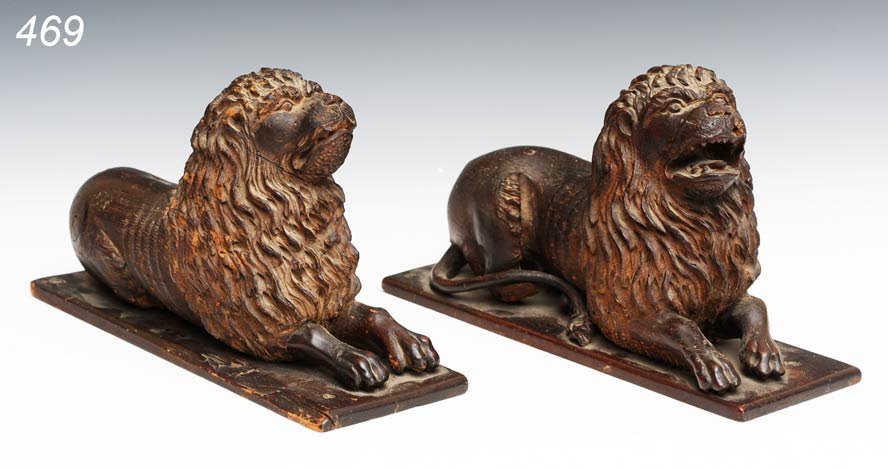 Pair of Swiss Carved Recumbant