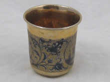 A Russian silver gilt beaker with