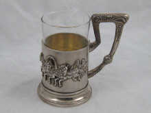 A large Russian silver tea glass