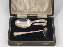 A childs silver spoon and pusher 14f577