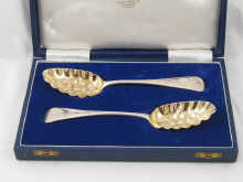 A boxed pair of bottom marked silver