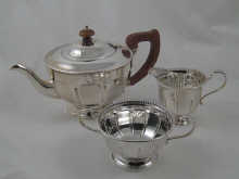 A three piece silver tea set by Goldsmiths