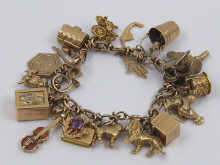 A 9 ct gold charm bracelet with