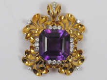 A fine amethyst and diamond pendant