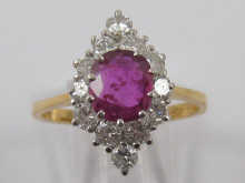 An 18 ct gold ruby and diamond