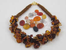 A naturalistic amber necklace together 14f5e3