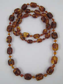 An amber bead necklace the largest