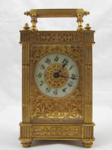 A French gilt carriage clock with pierced