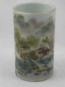 A Chinese ceramic brush pot finely painted