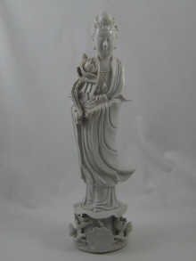 A Blanc de Chine figure of a Chinese
