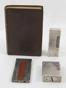 A Dunhill table lighter designed as