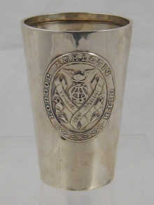 A silver tapered beaker with raised 14f65a