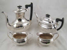 A four piece silver plate tea set