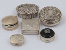 Six silver pillboxes.