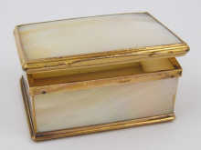 A gilt metal and mother of pearl snuff