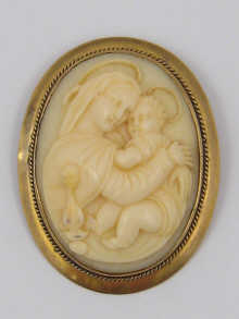 A finely carved ivory cameo depicting