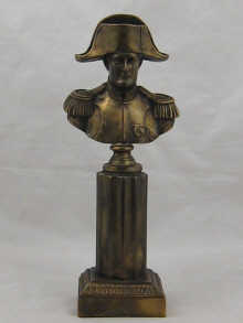 A cast metal bust of Napoleon on 14f718