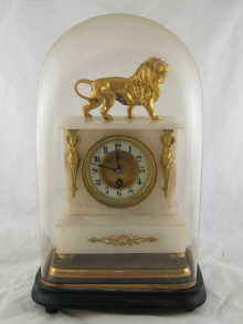 A 19th century alabaster mantel clock