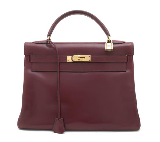 An Hermes Kelly Soft Red Calf Bag with