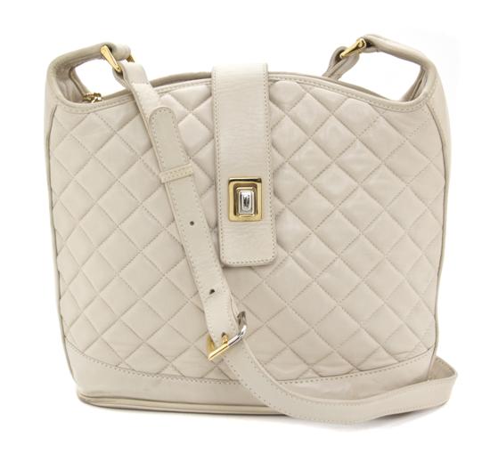 A Judith Leiber Off-White Quilted Leather