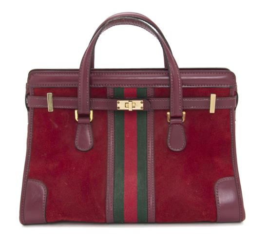 A Gucci Red Suede Bag Stamped  152124