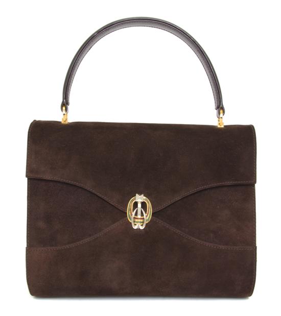 A Gucci Brown Suede Handbag. Stamped: