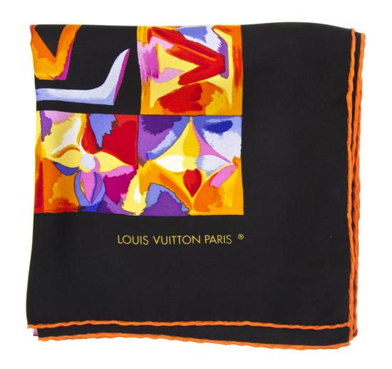 A Louis Vuitton Silk Scarf in a