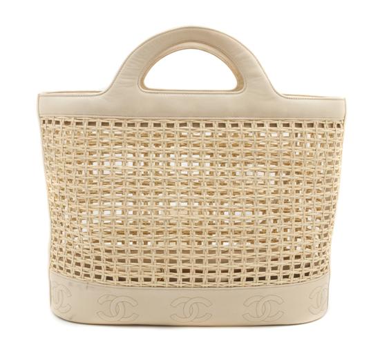 A Chanel Tan Straw and Leather 152152