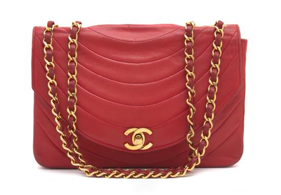 A Chanel Red Leather Bag with a