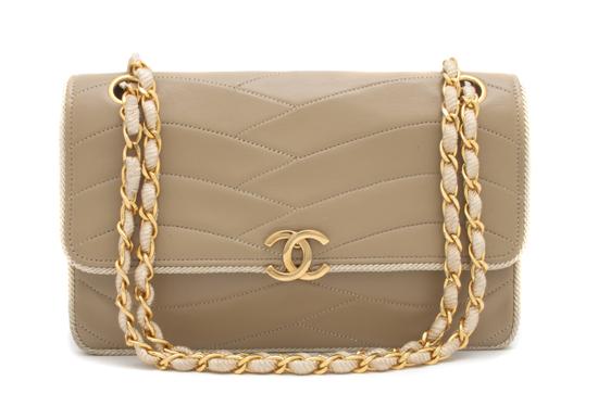A Chanel Tan Leather and Cord Bag 152154
