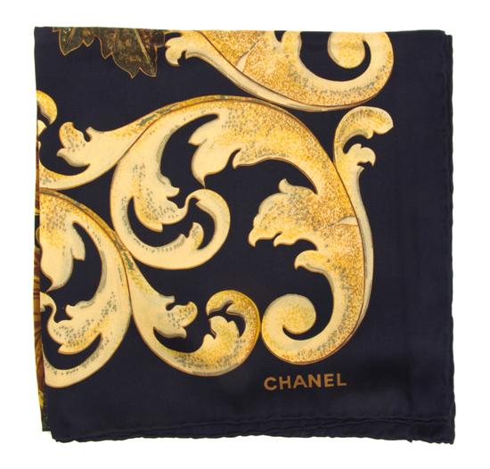 A Chanel Silk Scarf in a sunflower