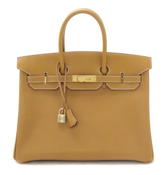 An Hermes Tan Leather Birkin Bag