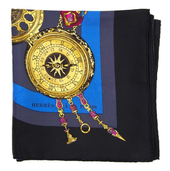 An Hermes Silk Scarf in a clock