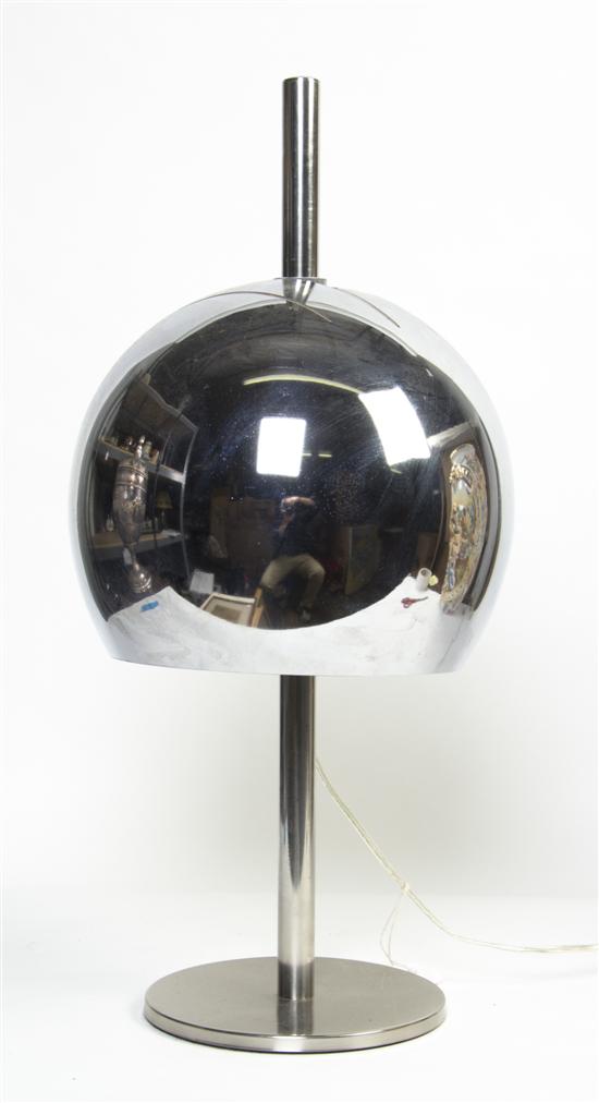 A Chrome Table Lamp the globe form