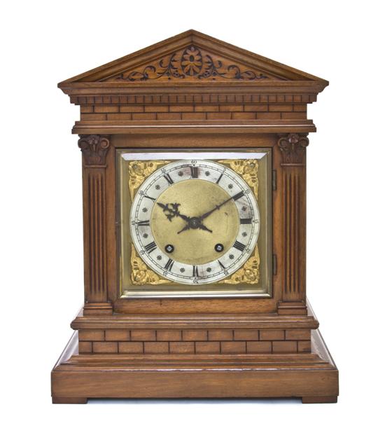 An English Oak Mantel Clock of peaked