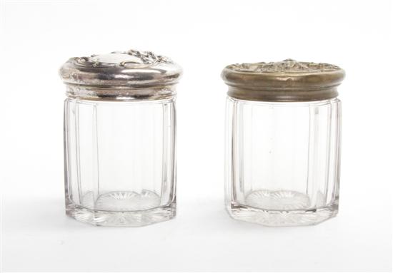 Two Metal Mounted Glass Jars each of