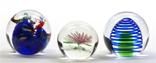 Three Glass Paperweights each of spherical